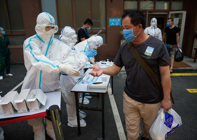 Beijing Tames New Infections of